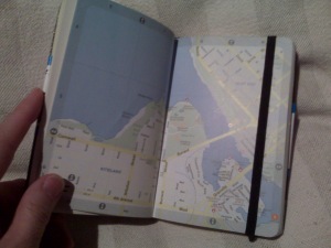 Includes a detailed city map